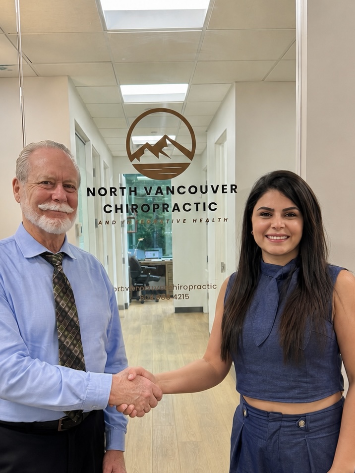 Dr. Robson and Dr. Elmira Amanollahi marking the ownership transition at North Vancouver Chiropractic